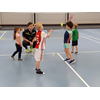Badmintonles groep 1-2 b